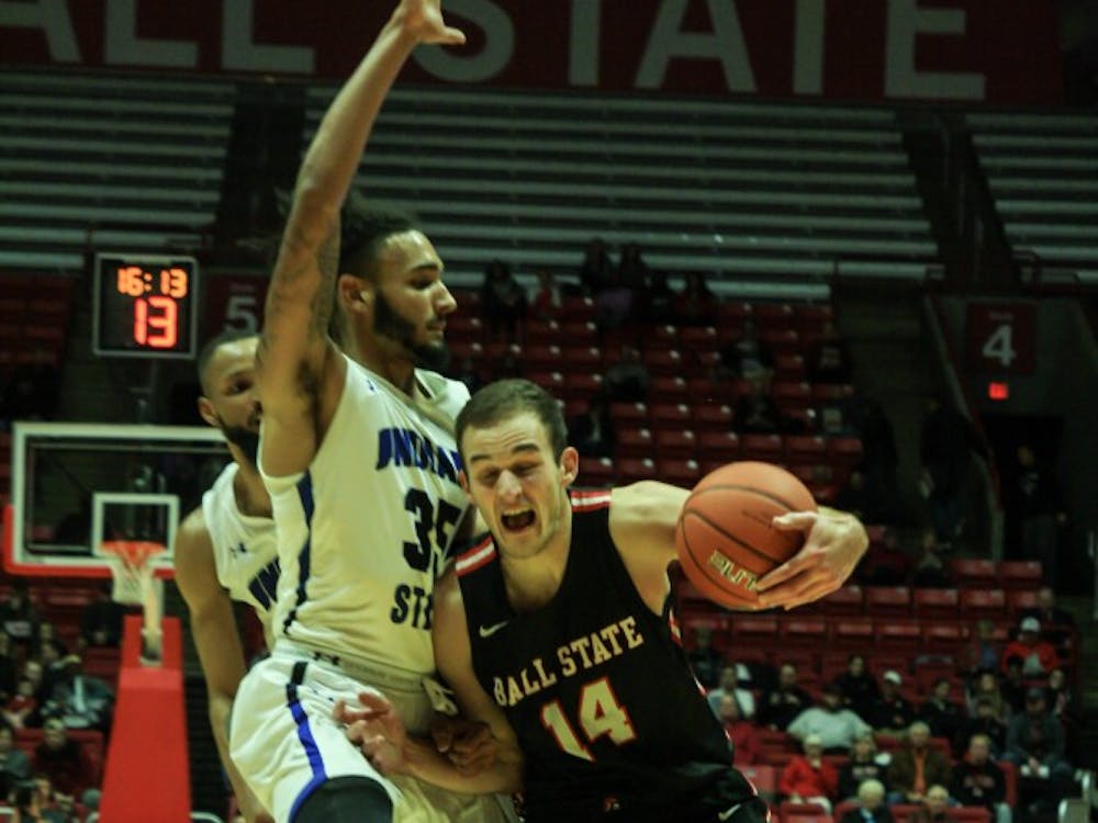 Indiana State center Devin Thomas guards forawrd Kyle Mallers as he heads towards the net at the Ball State men's basketball game versus Indiana State Nov. 6, 2018 in John E. Worthen Arena. Mallers had a total playing time of 28 minutes. Tailiyah Johnson,DN