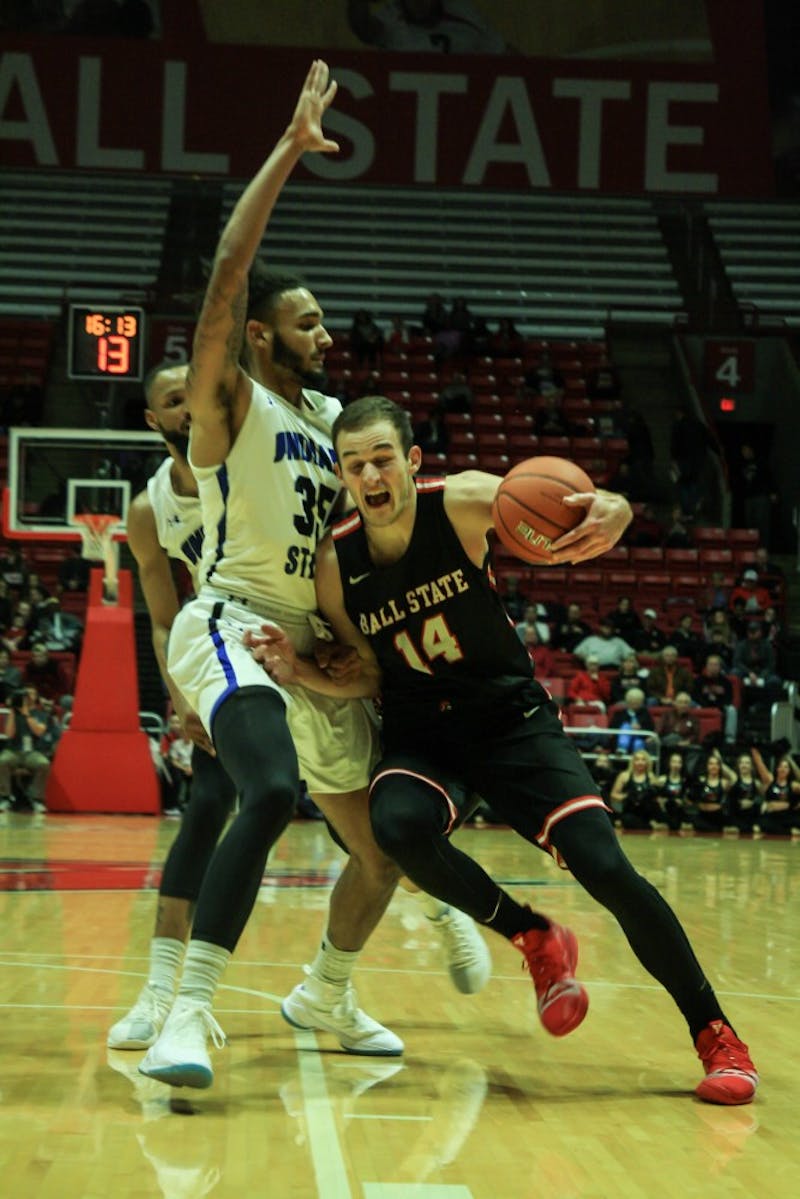 Indiana State center Devin Thomas guards forawrd Kyle Mallers as he heads towards the net at the Ball State men's basketball game versus Indiana State Nov. 6, 2018 in John E. Worthen Arena. Mallers had a total playing time of 28 minutes. Tailiyah Johnson,DN