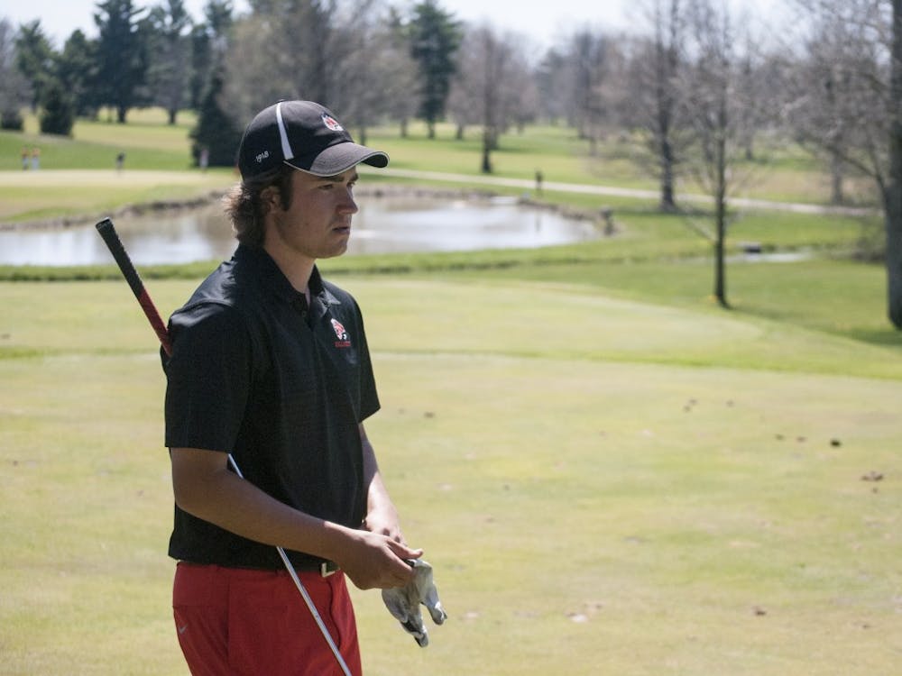 Sophomore golfer Johnny Watts gets ready to tee off on the par-3 16th hole at Delaware Country Club in the Earl Yestingsmeier Invitational. Watts finished the tournament in a three-way tie for the second place while the Cardinals won the team title. DN PHOTO COLIN GRYLLS