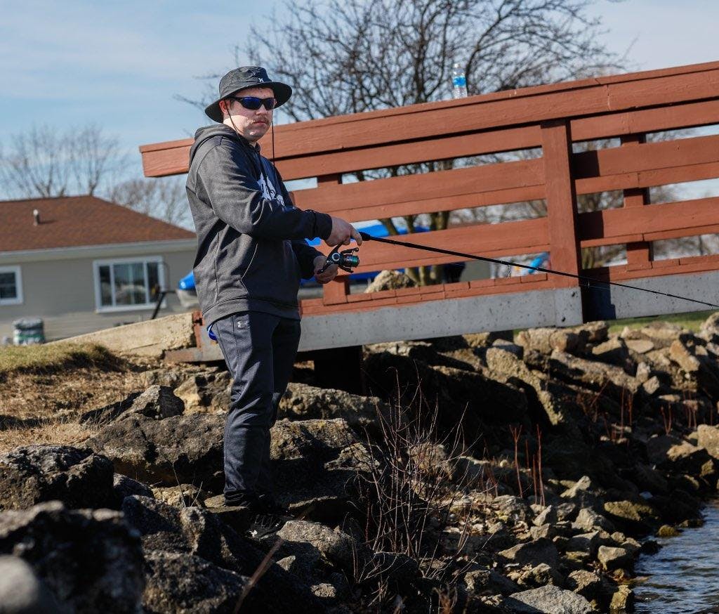 Sophomore associate sports editor Zach Carter fishes in an outlet off of Grand Lake March 12 in Celina, Ohio. Andrew Berger, DN