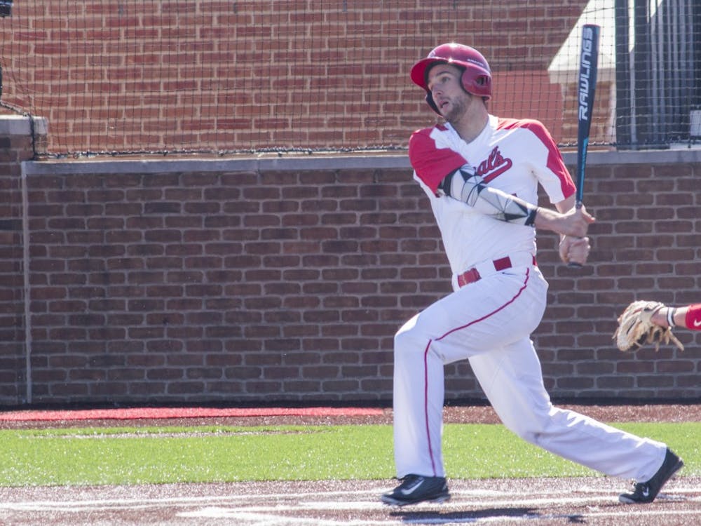 Ball State men’s baseball player Jeff Riedel hits the ball during the game against the University of Dayton on March 18 at the Baseball Diamond at First Merchant’s Ballpark Complex. Briana Hale, DN