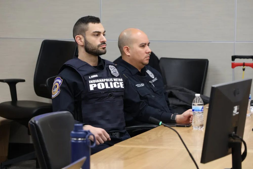 IMPD officers Adam Ahmad (from left) and Steven Sanchez sat on trial in Marion Superior Court on Dec. 6, 2024. A jury found them not guilty in the death of Herman Whitfield III. Credit: Kyle Fisher/WISH-TV