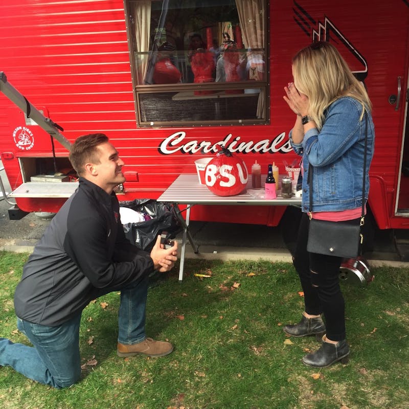 Former Ball State football captain Ben Ingle proposes to Anna Phares before the Cardinals’ Homecoming game on Saturday, Oct. 21. Ingle and Phares, who both graduated from Ball State in December 2015, met in Dr. Ronald Truelove’s psychology class. Ben Ingle, photo provided.