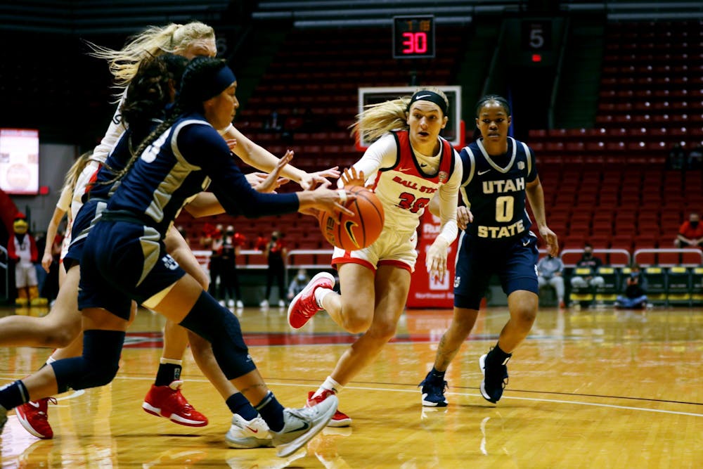 Redshirt junior Anna Clephane (30) goes for the ball against Utah State on Dec. 11, 2021, at Worthen Arena, in Muncie, Indiana. Clephane was a lead scorer with 16 points during the game. Amber Pietz, DN
