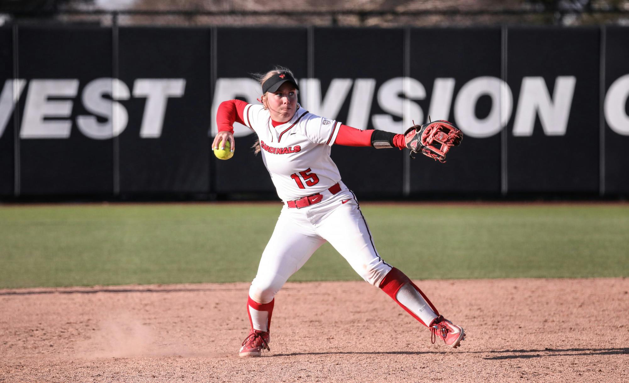 Senior infielder Haley Wynn fires the ball to first base in a game against Northern Illinois March 28 at the First Merchants Ballpark Complex. Ball State lost to Northern Illinois 10-14. Katelyn Howell, DN