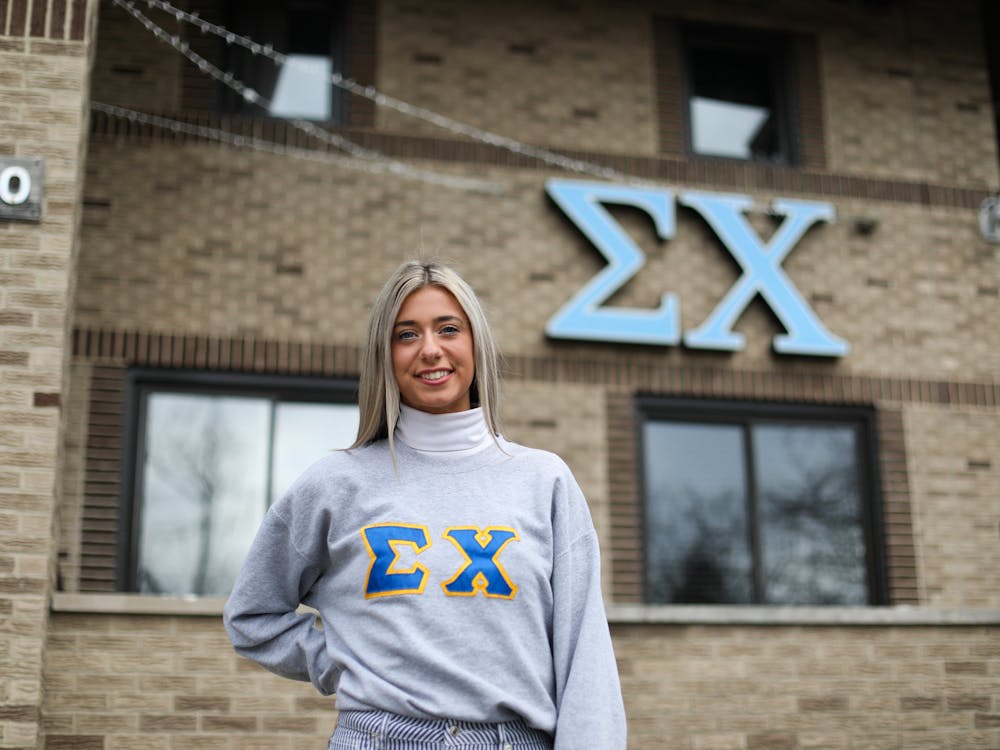 Third-year architecture major Brooke Fuller poses in the Sigma Chi fraternity house Jan. 24. Fuller is the fraternity&#x27;s sweetheart. Jacy Bradley, DN