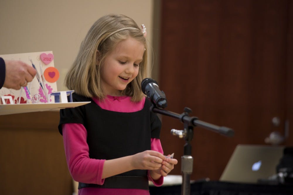<p>Charlotte Glowacki, 8, was one of the winners of&nbsp;the Muncie Big Read Artistic Competition on Feb. 29 in the L.A. Pittenger Student Center ballroom. The competition asks members of the community to create an artistic piece based on the book “Fahrenheit 451” by Ray Bradbury.<em> DN PHOTO STEPHANIE AMADOR</em></p>