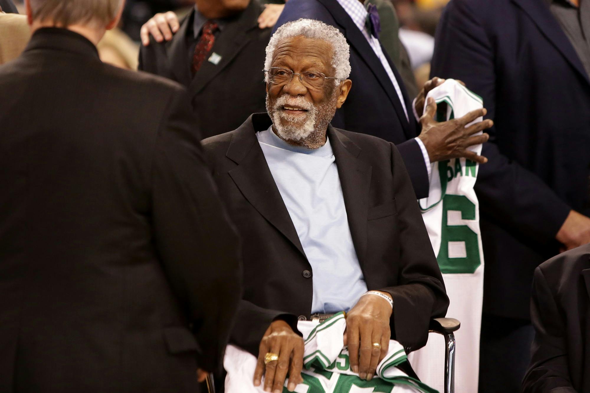 Member of the Boston Celtics' 1966 Championship team Bill Russell is honored at halftime of a game between the Boston Celtics and the Miami Heat at TD Garden on April 13, 2016, in Boston. (Mike Lawrie/Getty Images/TNS)