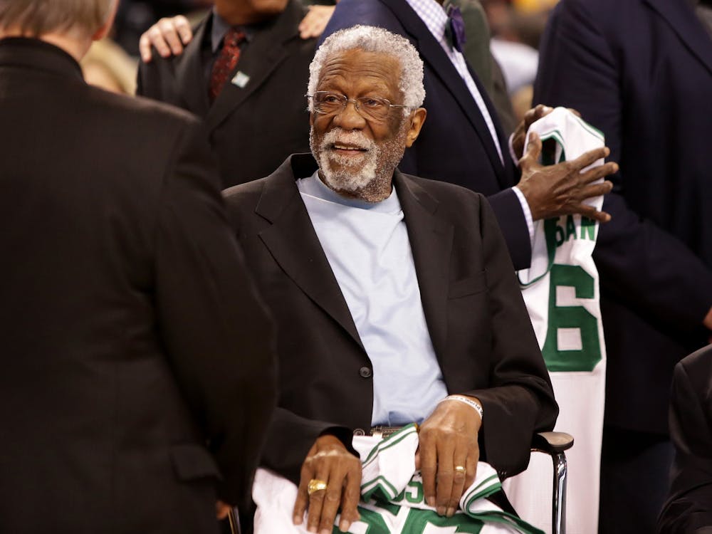 Member of the Boston Celtics' 1966 Championship team Bill Russell is honored at halftime of a game between the Boston Celtics and the Miami Heat at TD Garden on April 13, 2016, in Boston. (Mike Lawrie/Getty Images/TNS)