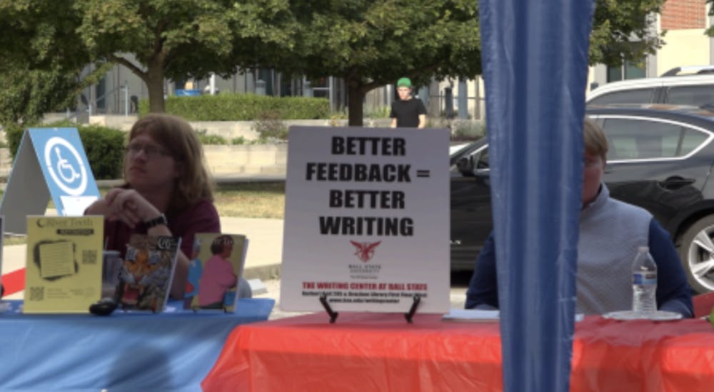 <p>A booth at the Star Party at the event promoting Ball State's writing center.</p><p><br></p><p>Shaylee Milom, NewsLink Indiana</p>