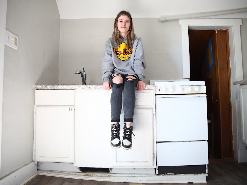Abbi Mastagh poses for a photo in her MiddleTown Property Group rental April 18. Jacy Bradley, DN