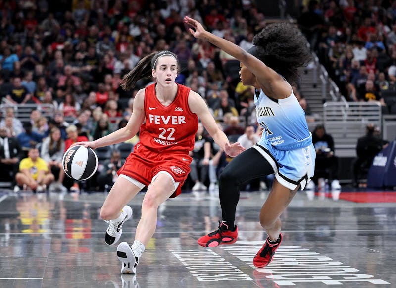 INDIANAPOLIS, INDIANA - JUNE 01: Caitlin Clark #22 of the Indiana Fever dribbles against Dana Evans #11 of the Chicago Sky during the first quarter in the game at Gainbridge Fieldhouse on June 01, 2024 in Indianapolis, Indiana. NOTE TO USER: User expressly acknowledges and agrees that, by downloading and or using this photograph, User is consenting to the terms and conditions of the Getty Images License Agreement. (Photo by Andy Lyons/Getty Images)