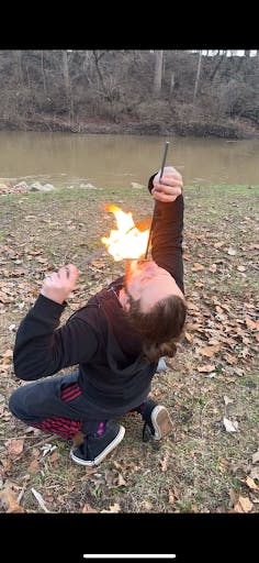 Braiden Robinson performs a special fire trick. 