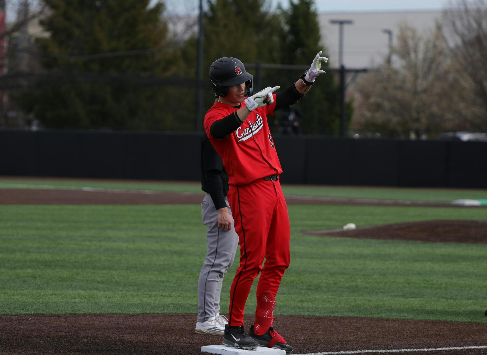 Ball State graduate utility Ryan Muizelaar celebrates after hitting a triple March 29 at Shebek Stadium. Muizelaar has a season high of 5 runs batted in. Adam Jones, DN