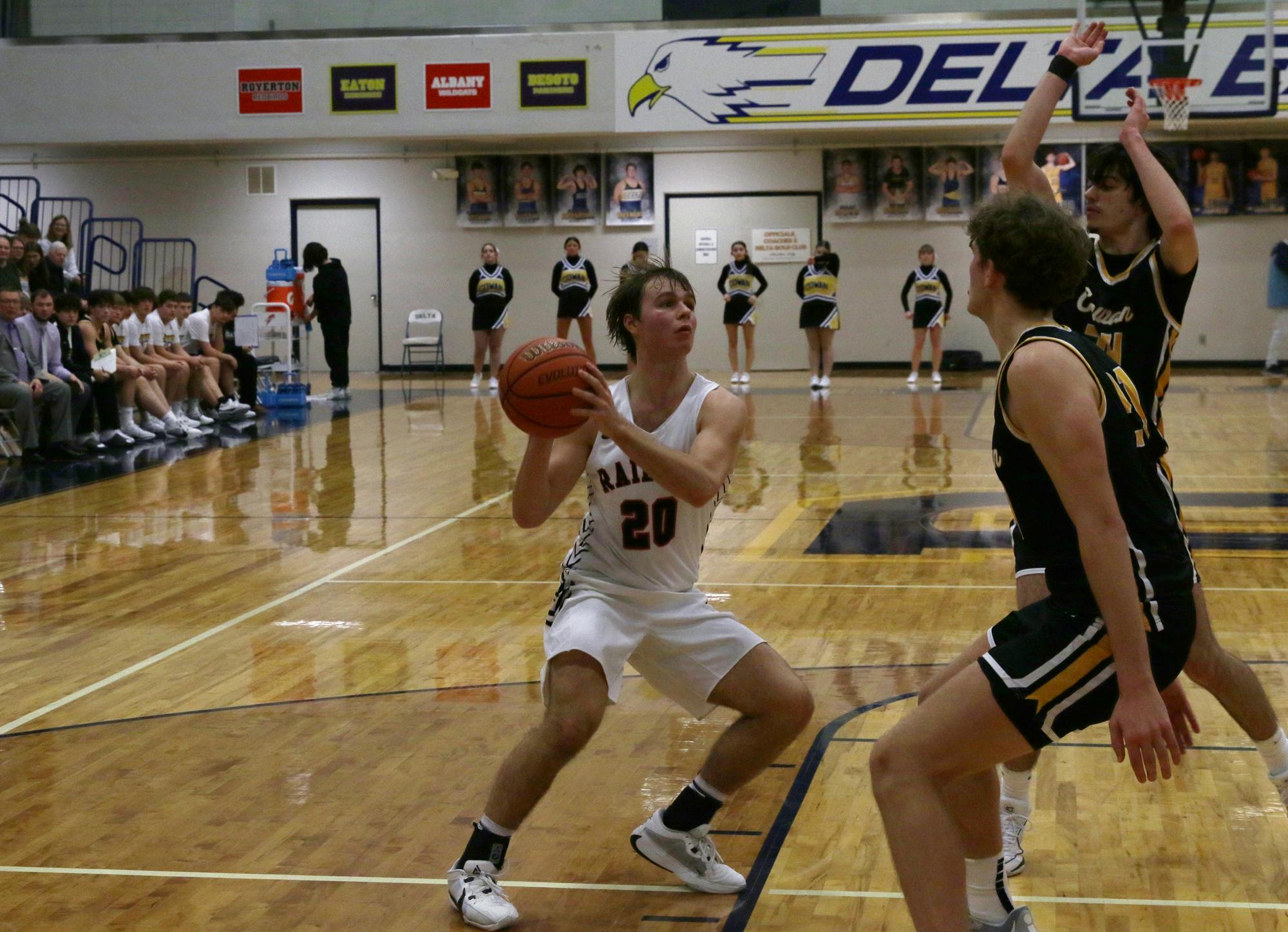 Wapahani senior Isaac Andrews dribbles Jan. 10 against Cowan in the Delaware County Tournament at Delta High School. David Moore, DN.