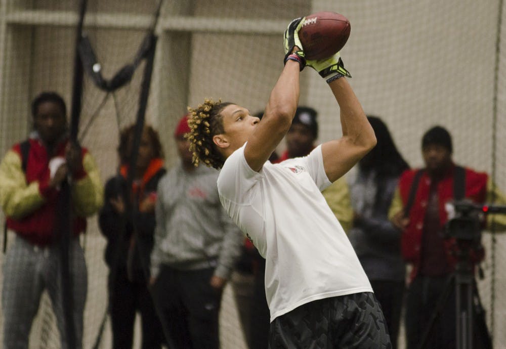 Willie Snead participates in a catching drill during Pro Day on March 27 at the Student Recreational Center. DN PHOTO BREANNA DAUGHERTY 