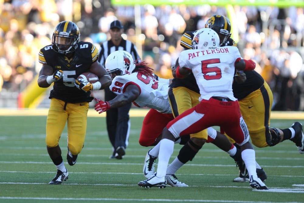 Iowa running back Damon Bullock makes his way down the field on Sept. 6 in Kinnick Stadium. Bullock had three carries for 17 yards on the game. Iowa defeated Ball State, 17-13. (The Daily Iowan/Tessa Hursh)