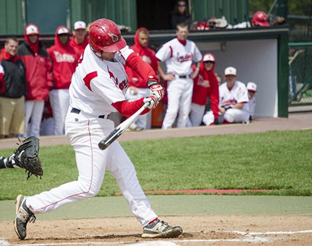 Senior Billy Wellman swings at a pitch against Eastern Michigan during a game on April 22, 2012. Wellman had a walk-off hit in the game against IPFW. DN FILE PHOTO DYLAN BUELL