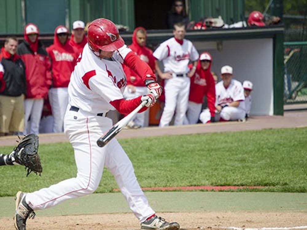 Senior Billy Wellman swings at a pitch against Eastern Michigan during a game on April 22, 2012. Wellman had a walk-off hit in the game against IPFW. DN FILE PHOTO DYLAN BUELL
