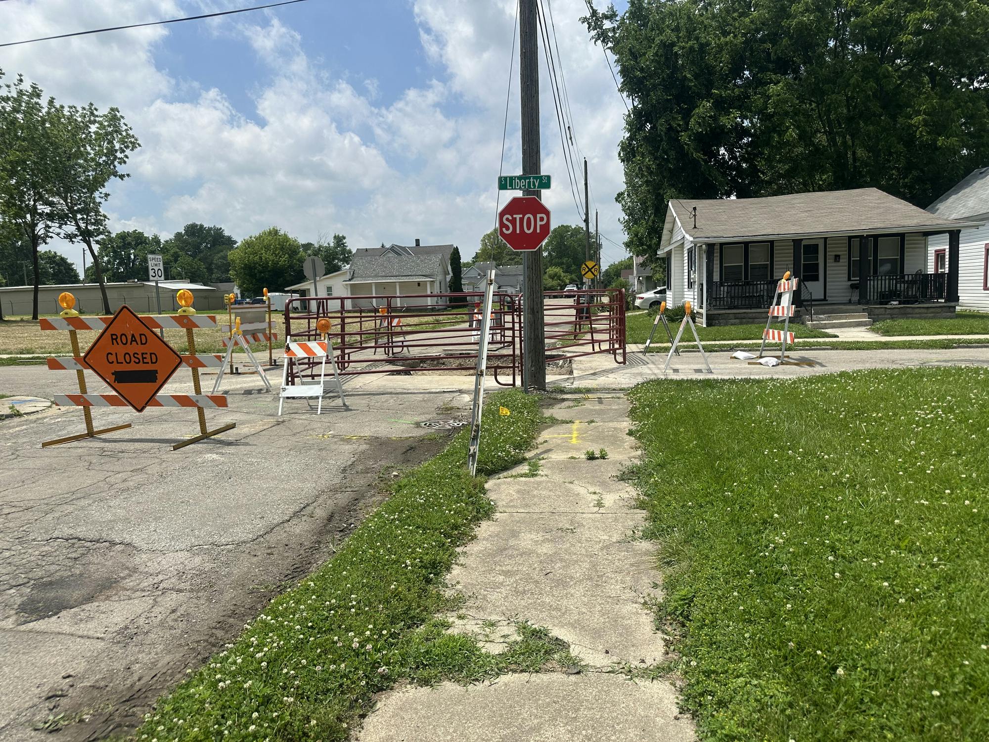 A photograph of a sinkhole at the intersection of 9th and Liberty Street in Muncie, Indiana, June 10, Cameron Noe, DN.