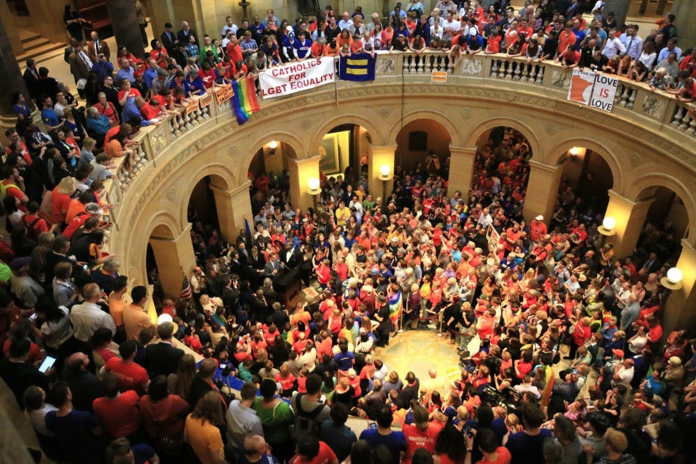 State Sen. Scott Dibble of Minneapolis addresses the crowded rotunda after the Minnesota Senate voted to approve a bill legalizing same-sex marriage, Monday, May 13, 2013, in St. Paul, Minnesota. (Brian Peterson/Minneapolis Star Tribune/MCT)