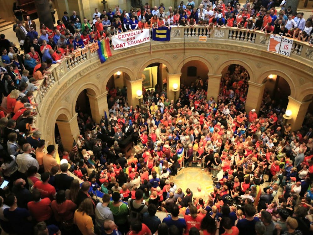 State Sen. Scott Dibble of Minneapolis addresses the crowded rotunda after the Minnesota Senate voted to approve a bill legalizing same-sex marriage, Monday, May 13, 2013, in St. Paul, Minnesota. (Brian Peterson/Minneapolis Star Tribune/MCT)