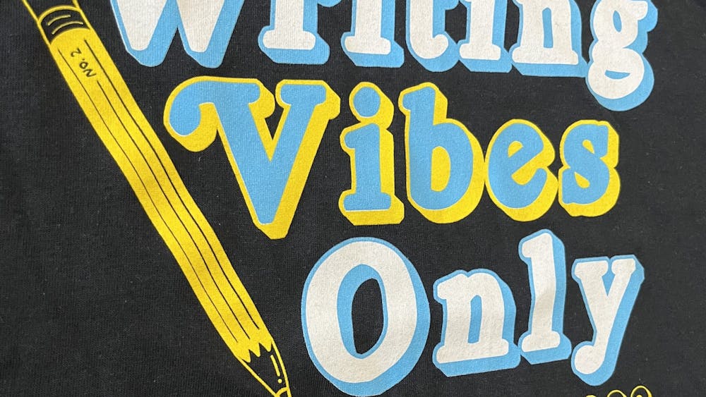 The T-shirt given to participants in Writing Camp 2022 held June 20-24, 2022 at Ball State University in Muncie, Indiana, reads, 'Writing Vibes Only". This camp teaches children in grades six-12 skills in journalism, creative writing and more. (Kyle Smedley/DN)