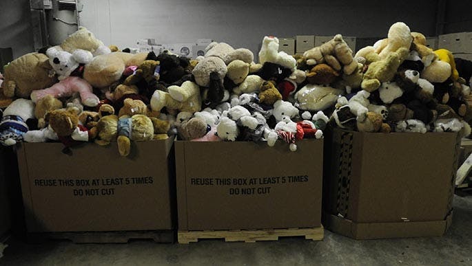 Donations sit in boxes at a warehouse in Newtown, Connecticut, on Thursday, December 27, 2012, where thousands of stuffed animals, toys and other gifts have been arriving after the Sandy Hook Elementary School shooting. (Rick Hartford/Hartford Courant/MCT)