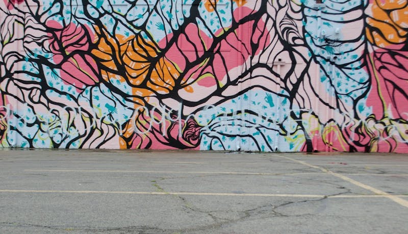 Mark III mural, downtown buildings defaced with graffiti