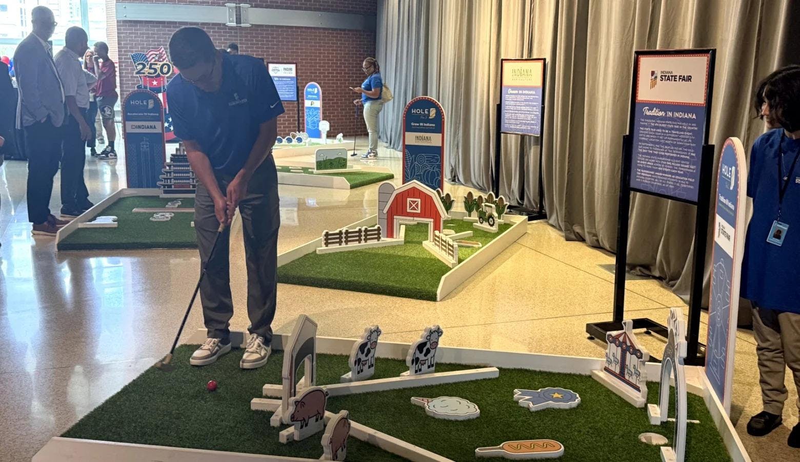 Five mini-golf courses that highlight various aspects of Indiana culture will showcase the state to a national audience. The mini-golf courses display the Indy 500, the Indiana State Fair, the Pacers and the state’s agricultural businesses. (Caroline Beck / WFYI)