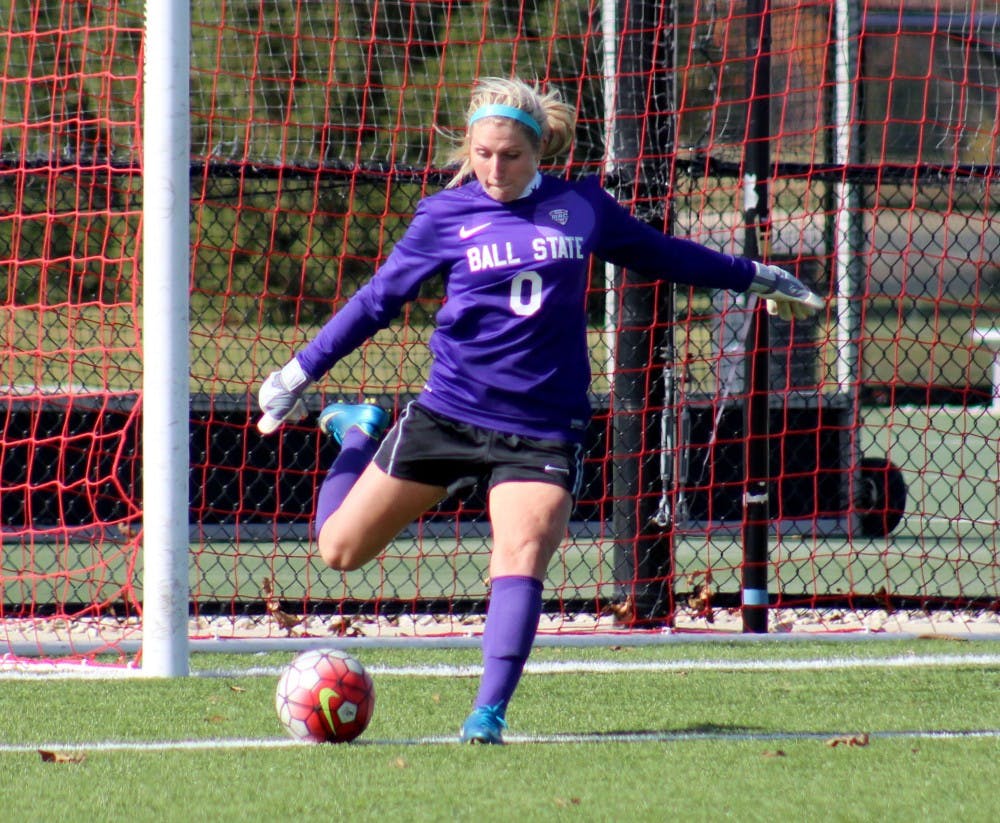 Sophomore goalie Alyssa Heintschel  attempts to kick the ball into the field in the match against Buffalo on Oct. 25 at the Briner Sports Complex. DN PHOTO ALLYE CLAYTON