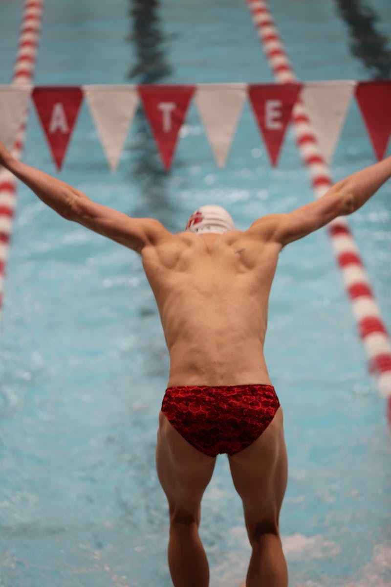 Ball State sophomore Joey Garberick begins his dive during the 200 yard medley event Oct. 28 in Lewellen Aquatic Center. The relay team from Ball State finished second in the event with a time of 133.59. Eli Houser, DN 