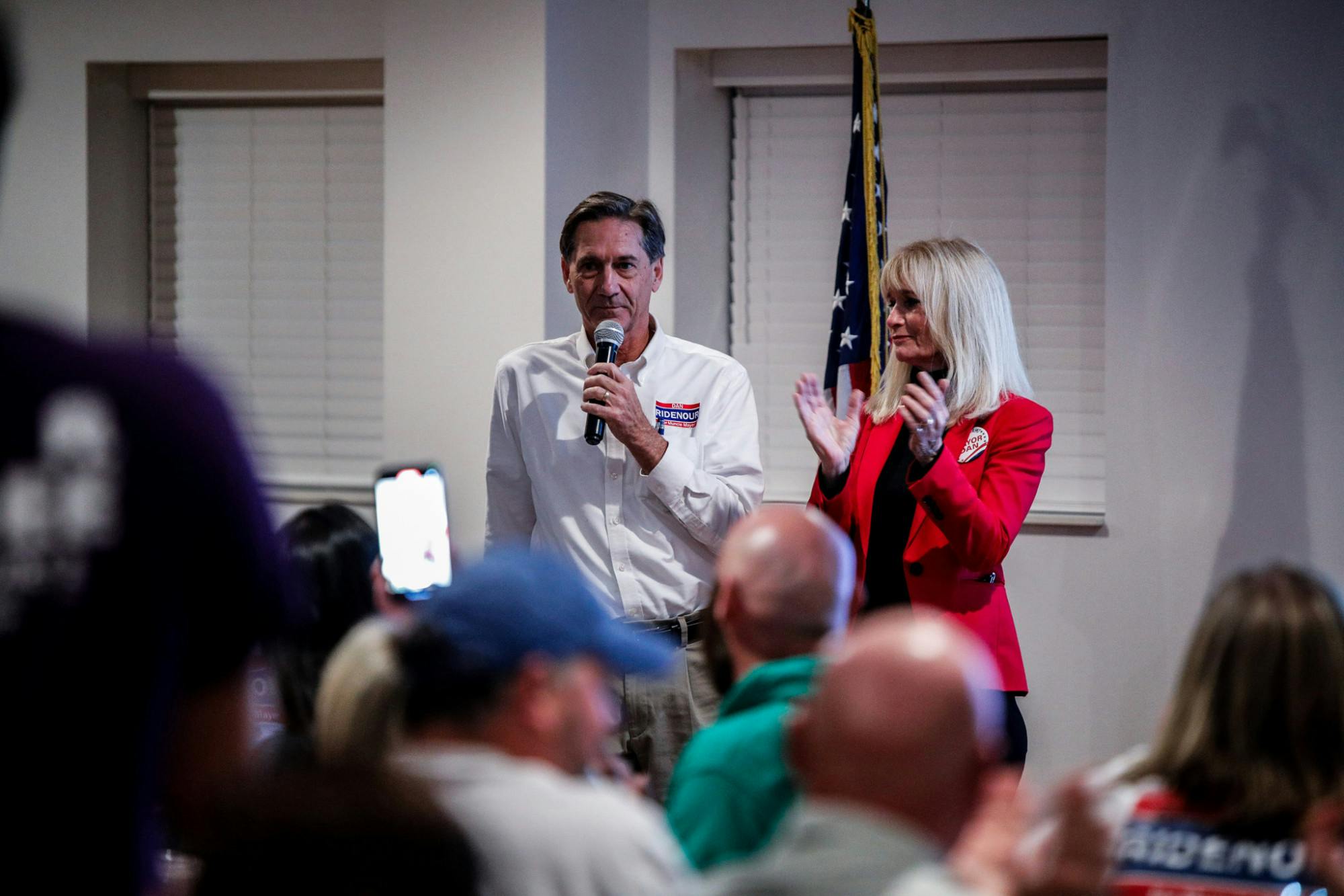 Incumbent Republican Mayor Dan Ridenour speaks to a crowd at Republican Headquarters with his wife, Sherri, Nov. 7, 2023. Ridenour beat Democratic candidate and former City Council President Jeff Robinson. Andrew Berger, DN