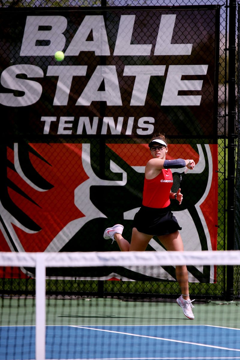Sophomore Mariya Polishchuk goes for the ball in the women's tennis MAC Champtionship match against Toledo May 1 at Cardinal Creek Tennis Courts. Amber Pietz, DN