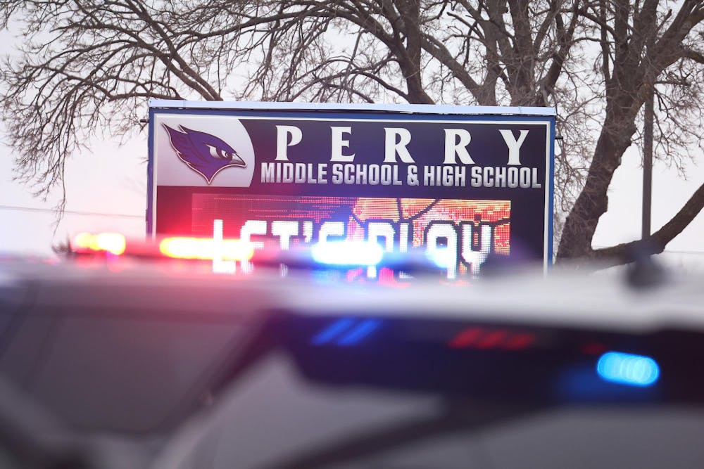 PERRY, IOWA - JANUARY 04: Police respond to a school shooting at the Perry Middle School and High School complex on January 04, 2024 in Perry, Iowa. Students were returning to classes today following the holiday break. (Photo by Scott Olson/Getty Images)