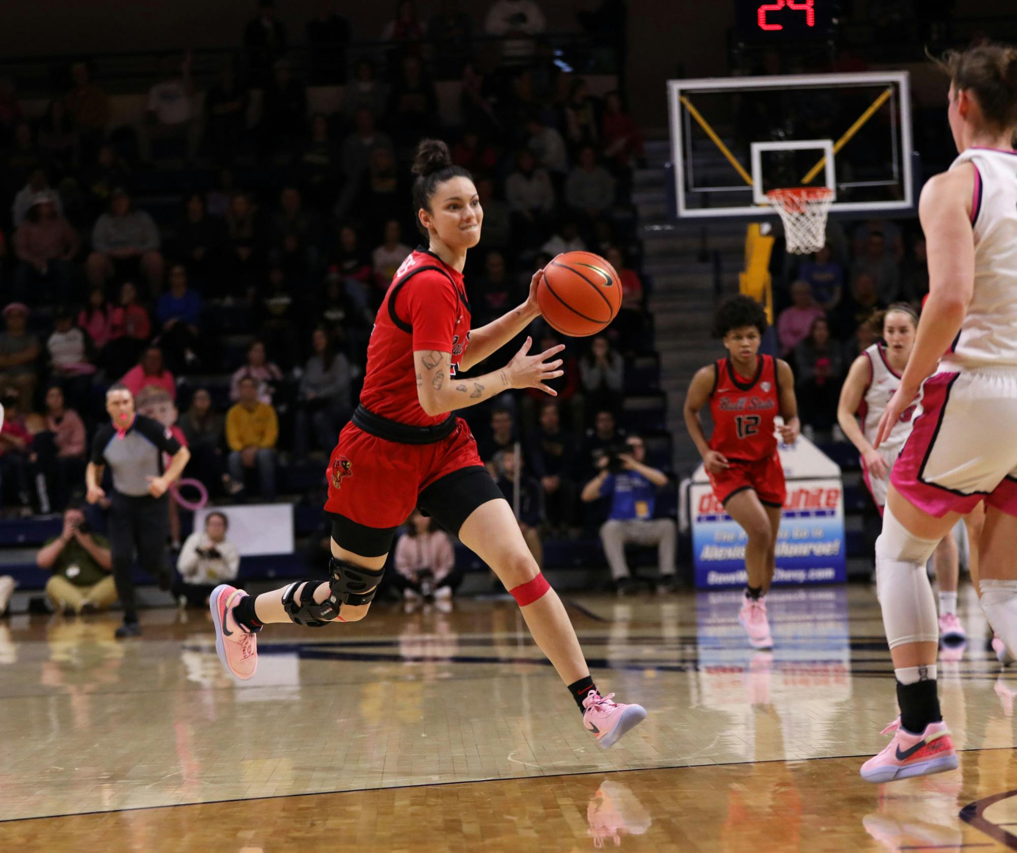 Senior Estel Puiggros dribbles the ball down court against Toledo Feb. 24 at Savage Arena in Toledo, Ohio. Puiggros played for 15 minutes of the game. Mya Cataline, DN