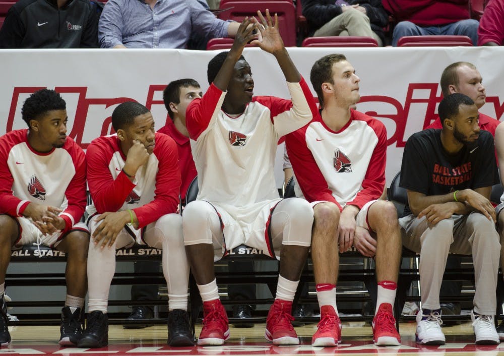 <p>Doudou Gueye sits next to his teammates during practice for Ball State's men's basketball on Feb. 24 in Worthen Arena. &nbsp;Gueye came to America to play basketball and get an education. Emma Rogers // DN</p>