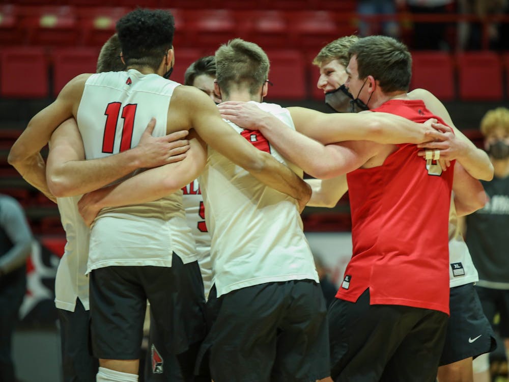 The Ball State Men&#x27;s volleyball team celebrates after scoring a point Feb. 20, 2021, at John E. Worthen Arena. Ball State won against the Lions 3-0. Jaden Whiteman, DN