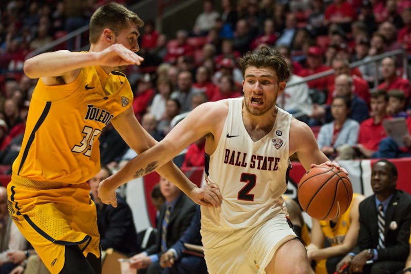 Junior Tayler Persons drives past a defender from Toledo, OH in an attempt to score in the first half at Worthen Arena. Feb. 17. Eric Pritchett, DN