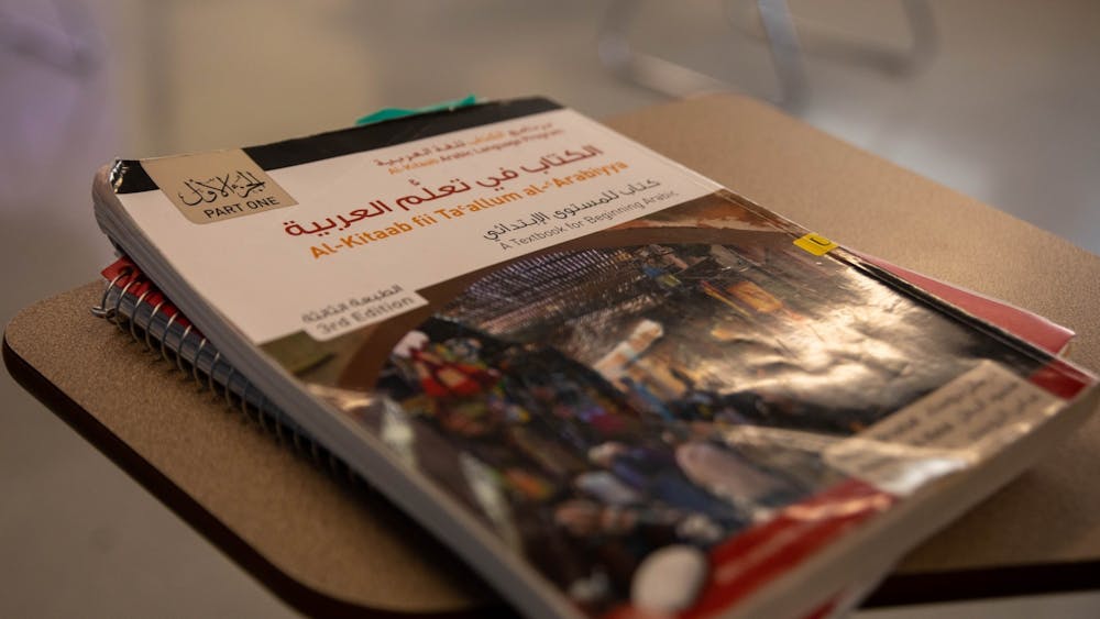 An Arabic language textbook sits on a desk March 24, 2021, in the Applied Technology Building. The reintroduction of the Advancing International and Foreign Language Education Act proposes to offer federal funds to smaller collegiate world language programs across the United States. Jaden Whiteman, DN File