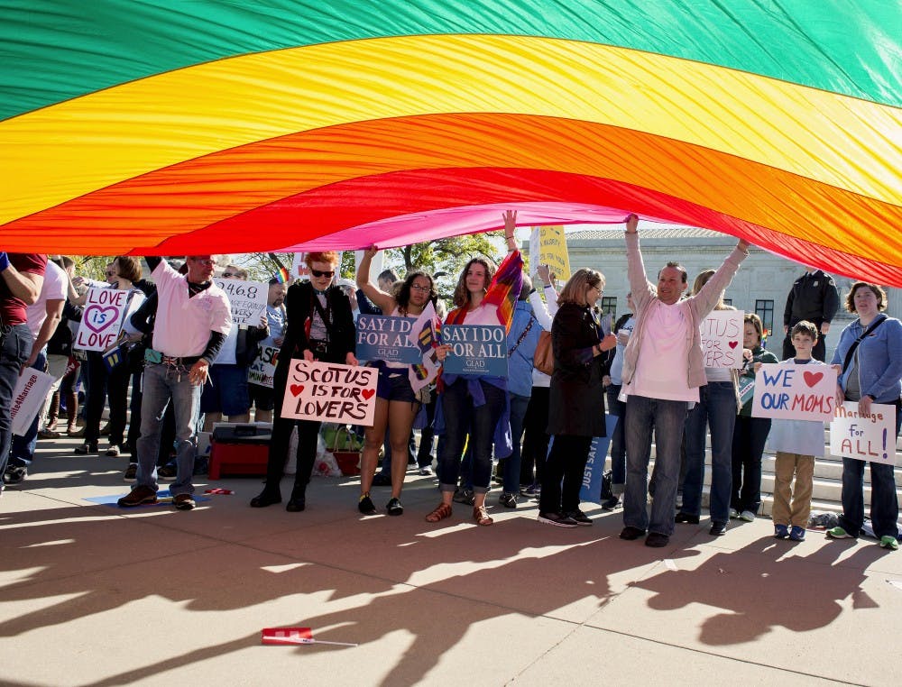 Pro and anti-gay marriage demonstrators rally outside the U.S. Supreme Court as it hears arguments on the question of same-sex marriage on Tuesday, April 28, 2015, in Washington, D.C. (Brian Cahn/Zuma Press/TNS)