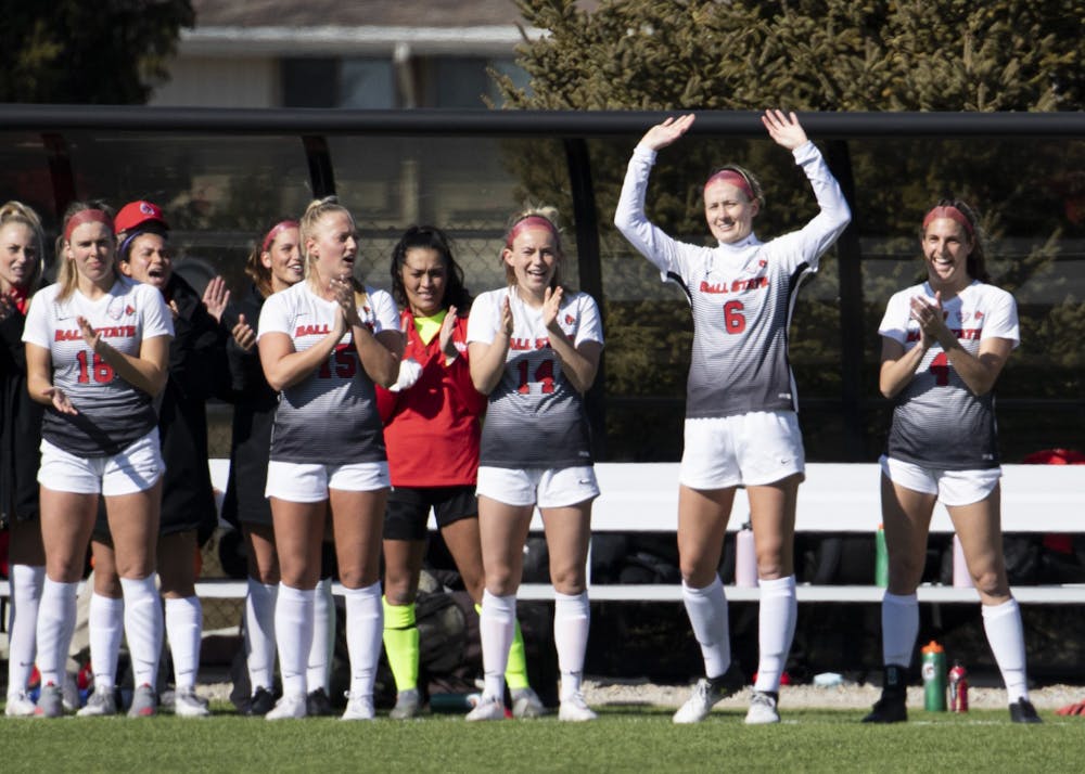 Cardinals senior defender Emily Simmons waves to the crowd as she's introduced before Ball State's home season opener against the Toledo Rockets March 4, 2021, at Briner Sports Complex. The Cardinals beat the Rockets 2-0. Jacob Musselman, DN