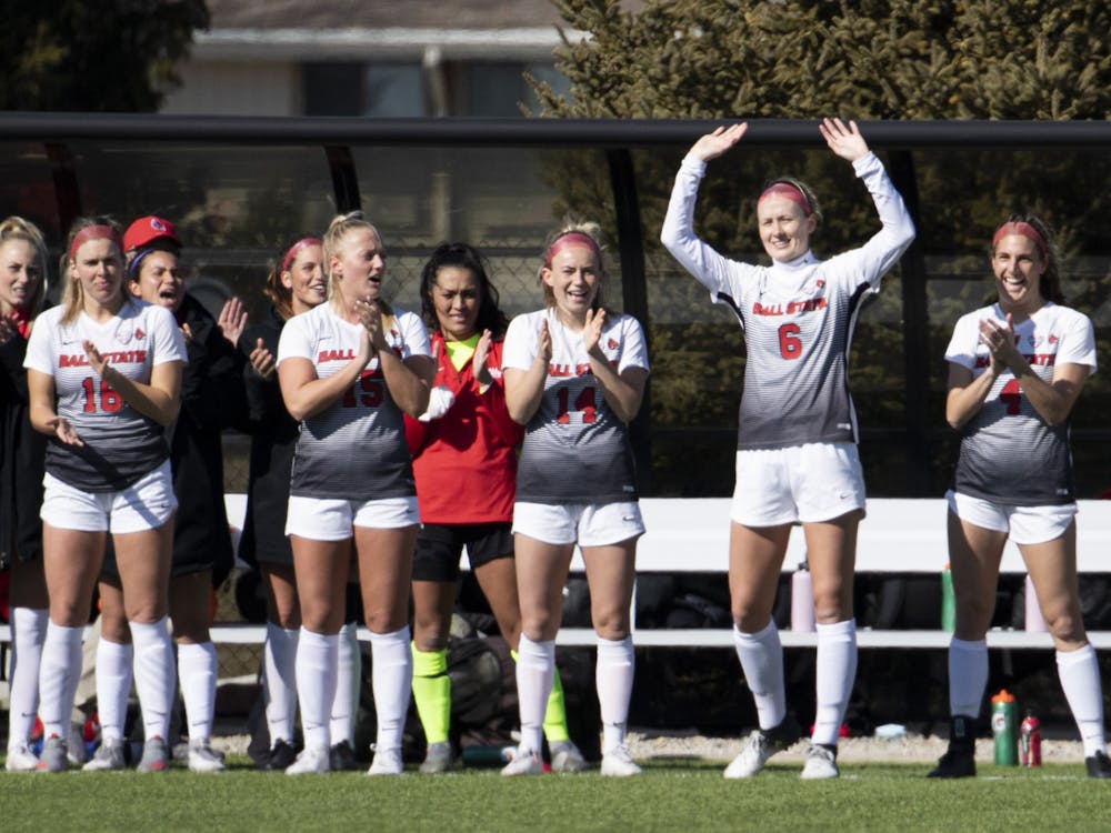 Cardinals senior defender Emily Simmons waves to the crowd as she's introduced before Ball State's home season opener against the Toledo Rockets March 4, 2021, at Briner Sports Complex. The Cardinals beat the Rockets 2-0. Jacob Musselman, DN