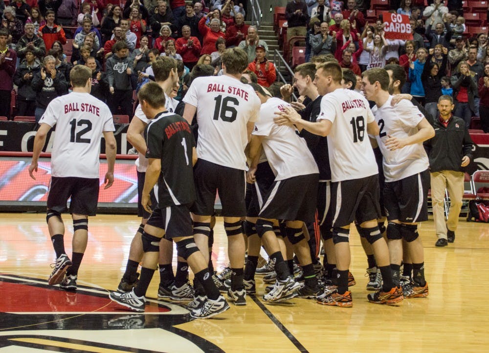 The Ball State men's volleyball team celebrates after winning the third and final set of the game against Ohio State on Feb. 21 at Worthen Arena. DN PHOTO ALAINA JAYE HALSEY