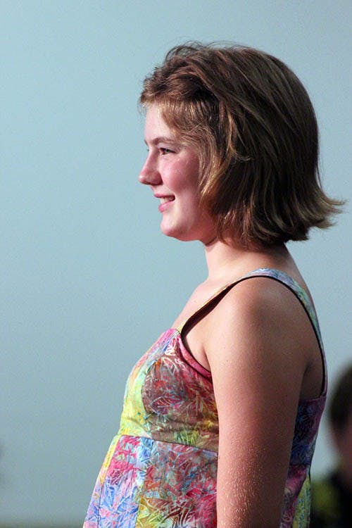 A Fashion Revue participant poses at the end of the runway Tuesday night.  Kindergarten through 12th graders showed off their homemade clothing and non-wearable items. DN PHOTO KRYSTAL BYERS