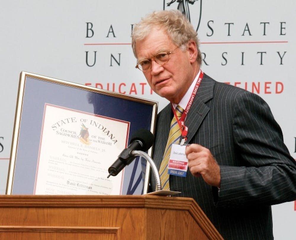 David Letterman jokes about whether he still needs to wear his name tag Friday afternoon as he accepts the Sagamore of the Wabash award during the the dedication of the David Letterman Communication and Media Building. Letterman will be returning to Ball State's campus Friday, Sept. 17. DN FILE PHOTO DAVID BOND