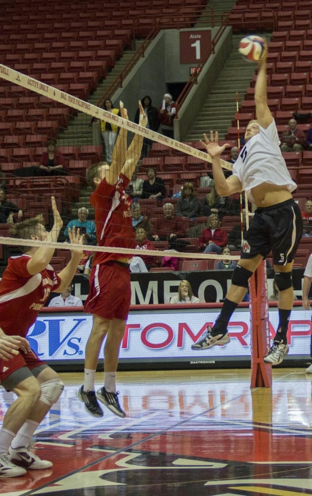 Graham McIlvaine, a senior setter, hits the ball against Sacred Heart on Jan. 11. After three sets, Ball State won the match, bringing its record to 1-1. DN PHOTO EMMA ROGERS