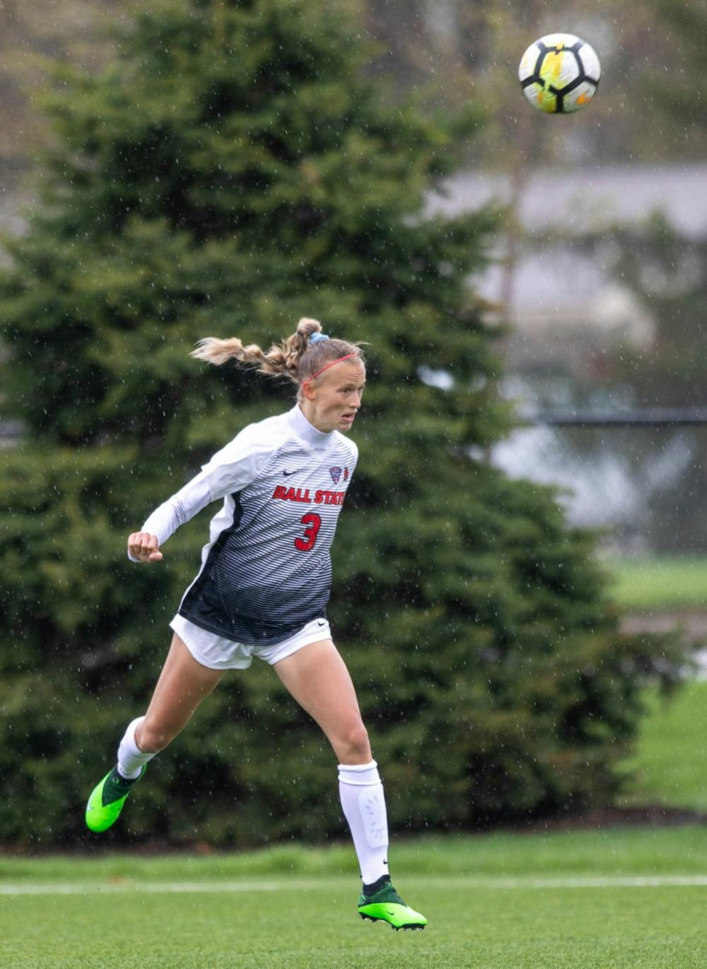 Junior defender Lexy Smith does a header April 11, 2021, at Briner Sports Complex. The Cardinals beat the Eagles 2-1 to become the Mid-American Conference West Division champions. Jaden Whiteman, DN