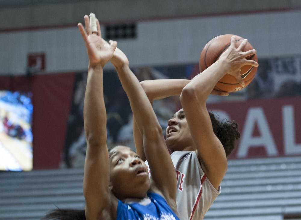 Sophomore forward Nathalie Fontaine attempts a layup during the game Jan. 26 against Buffalo. Fontaine scored 14 points in the game and had 14 rebounds. DN PHOTO JONATHAN MIKSANEK