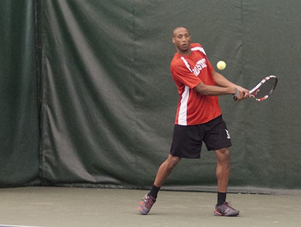 Senior Alexandre Brym returns a volley against Anderson Feb. 23 at the YMCA. The men's tennis team lost to Notre Dame 2-5 on Monday.  DN FILE PHOTO EMMA FLYNN